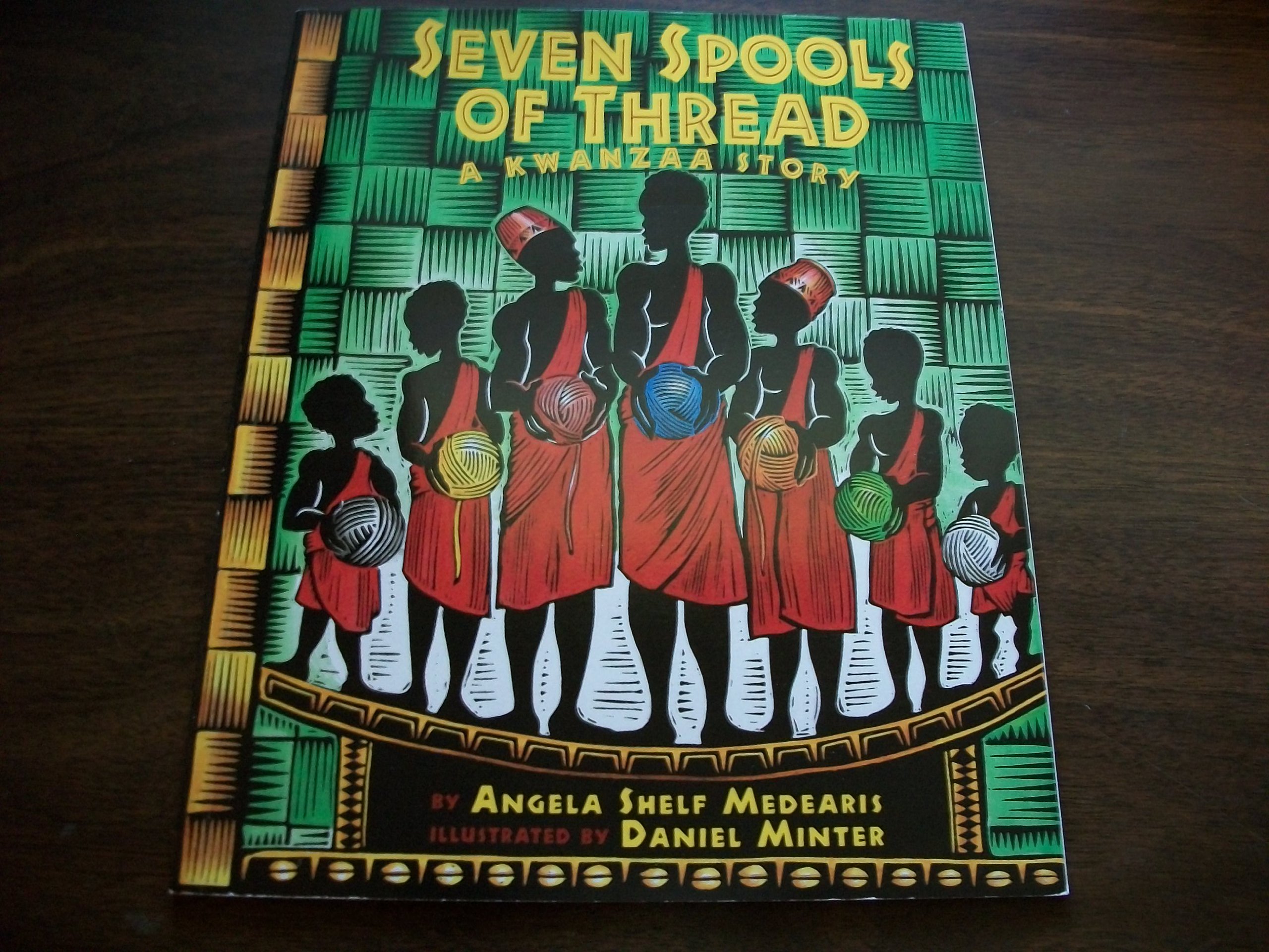 Seven Spools of Thread: A Kwanzaa Story